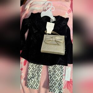 Black Velvet Ruffle Shoulder Top with Patterned Leggings and Glitter Bow Purse